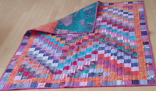 Pink and purple checkered quilt